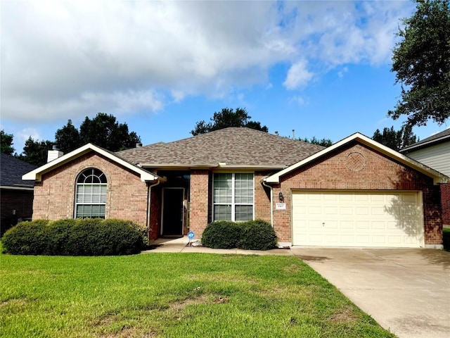 1907 Rutherford Dr, Leander, TX 78641 - single story home featuring an attached garage, brick siding, concrete driveway, a front yard, and roof with shingles