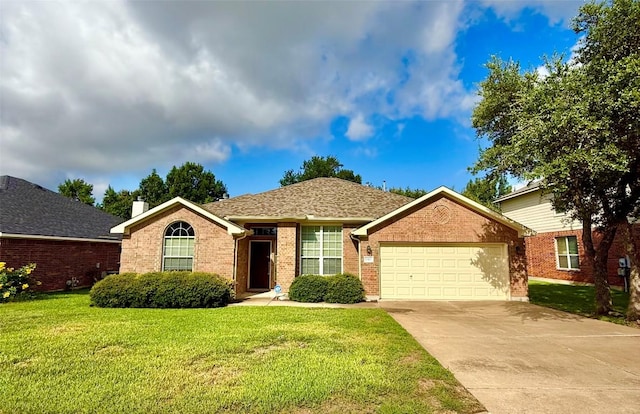 1907 Rutherford Dr, Leander, TX 78641 - ranch-style house featuring an attached garage, a front yard, concrete driveway, and brick siding