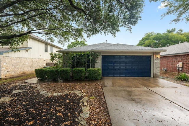 8943 W Hove Loop, Austin, TX 78749 - ranch-style house with concrete driveway and a garage
