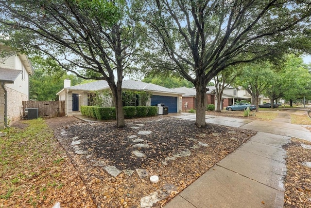 8943 W Hove Loop, Austin, TX 78749 - view of front of house with concrete driveway and a garage