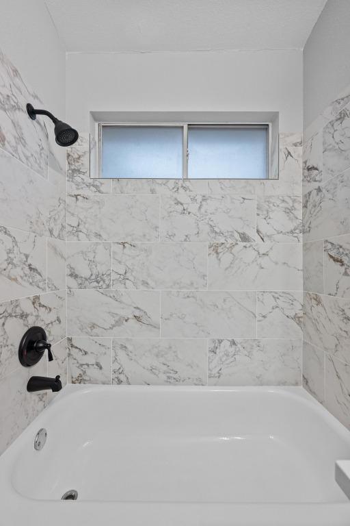 8943 W Hove Loop, Austin, TX 78749 - bathroom featuring  shower combination