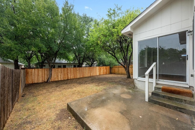 8943 W Hove Loop, Austin, TX 78749 - fenced backyard with entry steps and a patio area