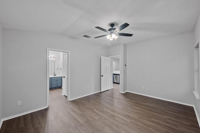 8943 W Hove Loop, Austin, TX 78749 - unfurnished bedroom with dark wood finished floors, ensuite bath, and ceiling fan