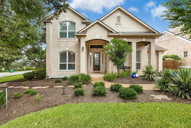 5100 Hadle Cv, Austin, TX 78730 - view of front of home with brick siding and a front yard