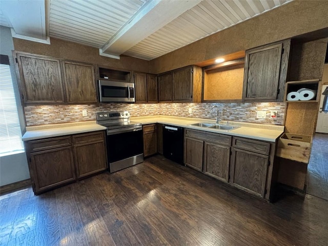 572 Eastern Ave, Bertram, TX 78605 - kitchen with appliances with stainless steel finishes, dark wood-type flooring, backsplash, beam ceiling, and light countertops