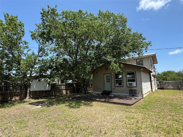 572 Eastern Ave, Bertram, TX 78605 - back of house with a fenced backyard, a patio area, and cooling unit