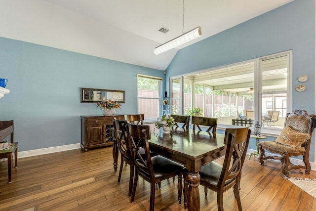 307 N Rainbow Bridge Dr, Cedar Park, TX 78613 - dining area with hardwood / wood-style flooring and lofted ceiling