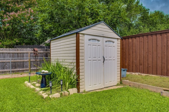 307 N Rainbow Bridge Dr, Cedar Park, TX 78613 - view of shed featuring a fenced backyard