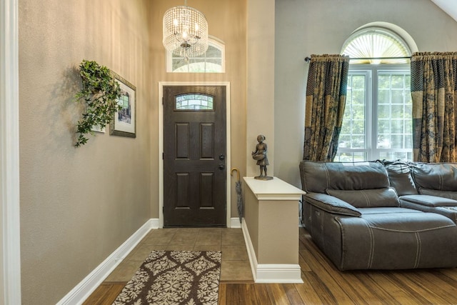 307 N Rainbow Bridge Dr, Cedar Park, TX 78613 - foyer entrance featuring a chandelier and wood finished floors