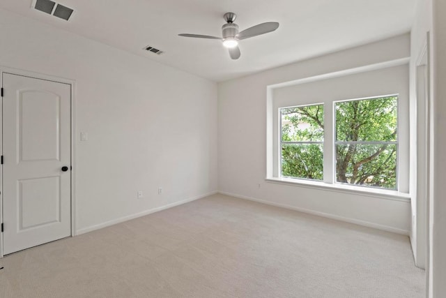 908 Lakewood Hills Ter, Austin, TX 78732 - unfurnished room with light colored carpet and ceiling fan