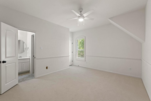 908 Lakewood Hills Ter, Austin, TX 78732 - unfurnished bedroom featuring light carpet, ensuite bathroom, and a ceiling fan