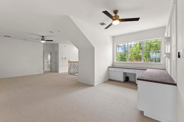 908 Lakewood Hills Ter, Austin, TX 78732 - additional living space with ceiling fan, light carpet, and built in desk