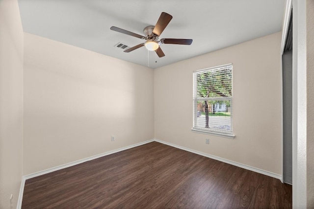 13620 Merseyside Dr, Pflugerville, TX 78660 - unfurnished room with dark wood finished floors and a ceiling fan