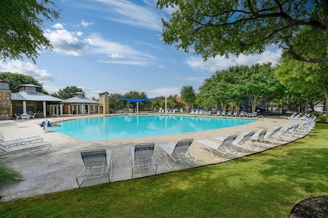 13620 Merseyside Dr, Pflugerville, TX 78660 - community pool featuring a patio area, a lawn, and a gazebo
