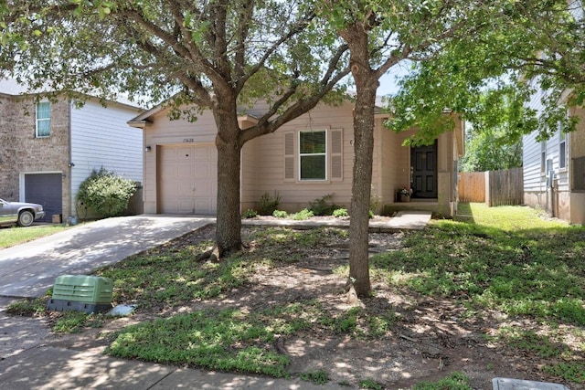 13620 Merseyside Dr, Pflugerville, TX 78660 - view of front of house featuring concrete driveway and a garage