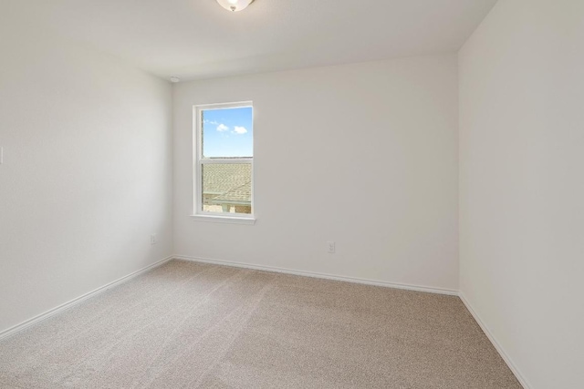 4852 Mozzafiato Ln, Round Rock, TX 78665 - empty room with light colored carpet and baseboards