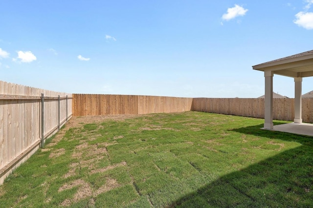 4852 Mozzafiato Ln, Round Rock, TX 78665 - fenced backyard with a patio