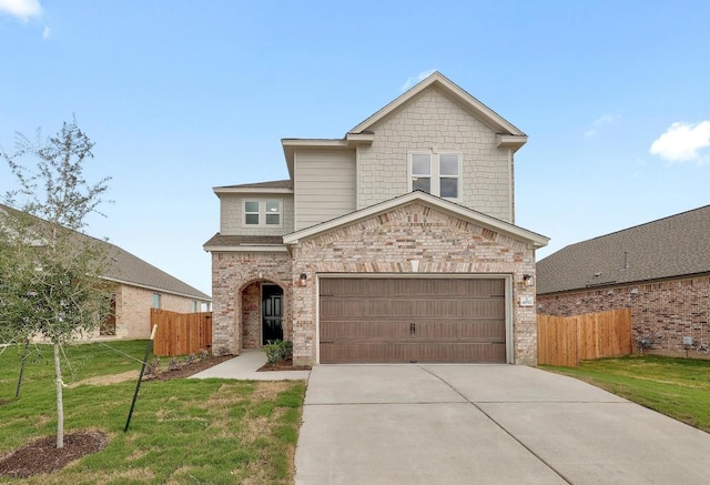 4852 Mozzafiato Ln, Round Rock, TX 78665 - view of front facade featuring driveway, an attached garage, and brick siding