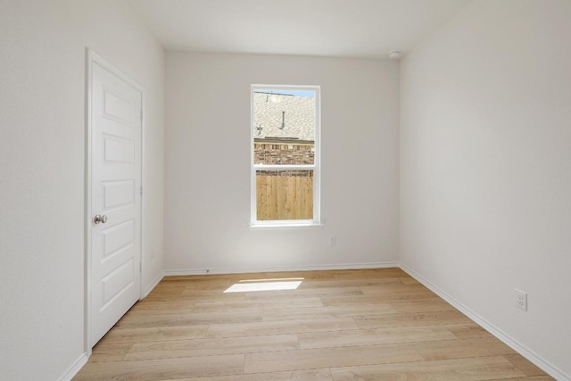 4852 Mozzafiato Ln, Round Rock, TX 78665 - spare room with light wood finished floors and a smoke detector