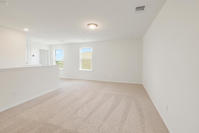 4852 Mozzafiato Ln, Round Rock, TX 78665 - unfurnished room featuring light carpet and recessed lighting