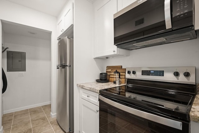 6718 Silvermine Dr Unit 802, Austin, TX 78736 - kitchen with appliances with stainless steel finishes, electric panel, white cabinetry, and light stone counters
