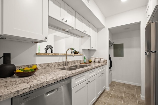 6718 Silvermine Dr Unit 802, Austin, TX 78736 - kitchen featuring appliances with stainless steel finishes, electric panel, and white cabinets