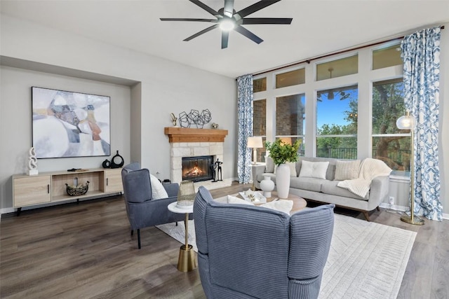 128 Big Sky Cv, Austin, TX 78737 - living area with ceiling fan, wood finished floors, and a fireplace