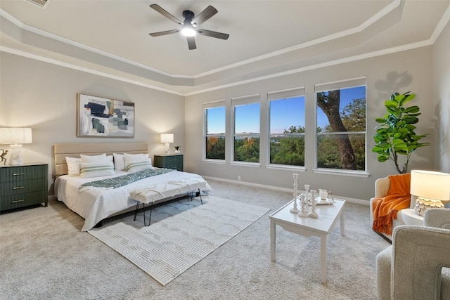 128 Big Sky Cv, Austin, TX 78737 - bedroom with a tray ceiling, light colored carpet, crown molding, and a ceiling fan