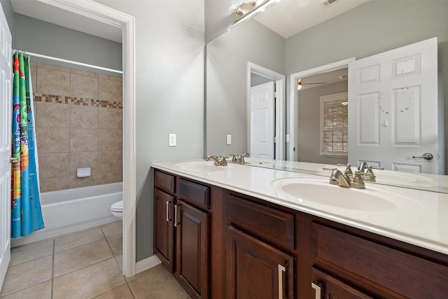 128 Big Sky Cv, Austin, TX 78737 - bathroom with double vanity, tile patterned floors, and shower / bath combo with shower curtain