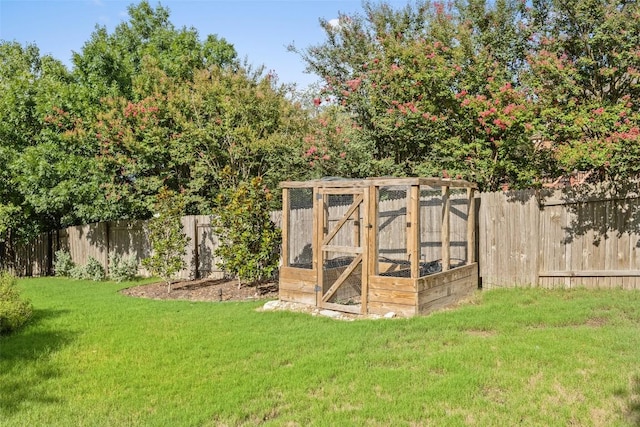 128 Big Sky Cv, Austin, TX 78737 - view of poultry coop with a fenced backyard