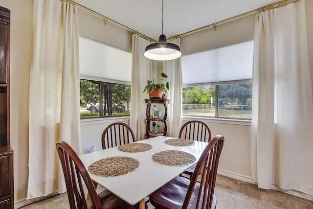 902 Linden St, Bastrop, TX 78602 - dining room featuring light colored carpet and baseboards