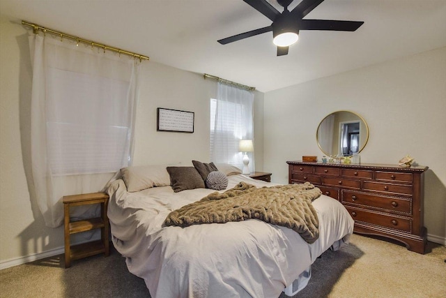 902 Linden St, Bastrop, TX 78602 - bedroom with light carpet and a ceiling fan