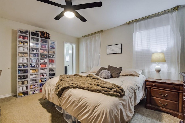902 Linden St, Bastrop, TX 78602 - bedroom with carpet floors and a ceiling fan