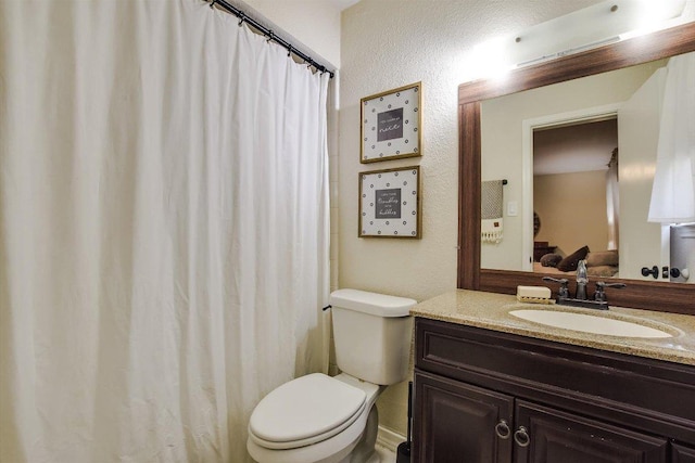 902 Linden St, Bastrop, TX 78602 - bathroom with vanity and a textured wall