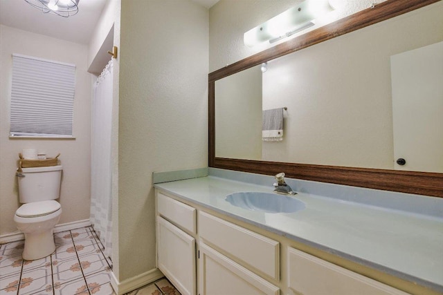 902 Linden St, Bastrop, TX 78602 - bathroom with vanity, curtained shower, and tile patterned flooring