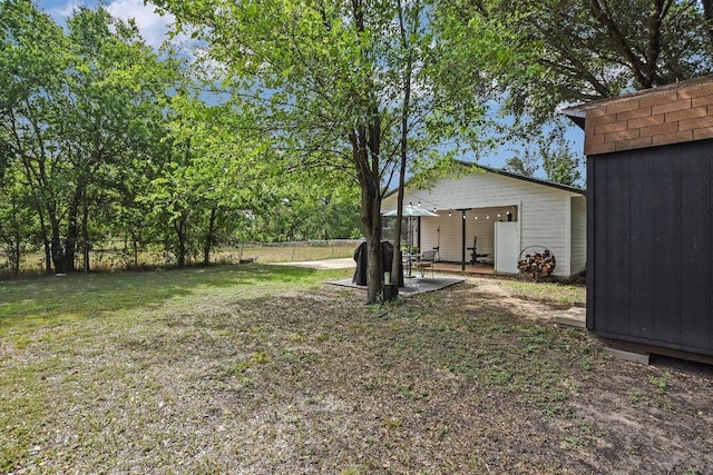 902 Linden St, Bastrop, TX 78602 - view of yard with a patio area