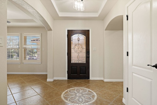 3608 Rockefeller Cv, Lago Vista, TX 78645 - tiled foyer featuring a raised ceiling and arched walkways