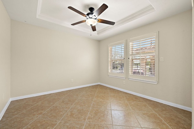 3608 Rockefeller Cv, Lago Vista, TX 78645 - unfurnished room featuring a tray ceiling, a ceiling fan, crown molding, and tile patterned floors