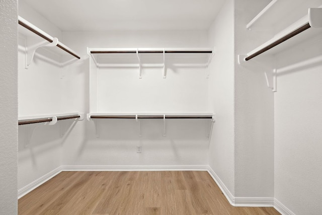 3608 Rockefeller Cv, Lago Vista, TX 78645 - spacious closet featuring wood finished floors