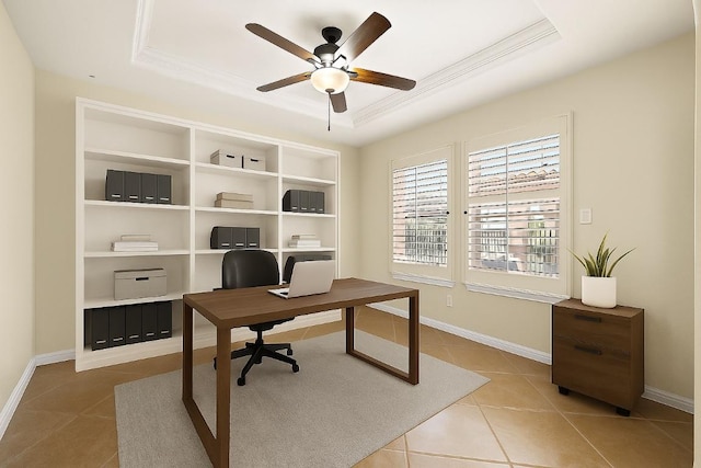 3608 Rockefeller Cv, Lago Vista, TX 78645 - office area featuring a raised ceiling, light tile patterned floors, a ceiling fan, and crown molding