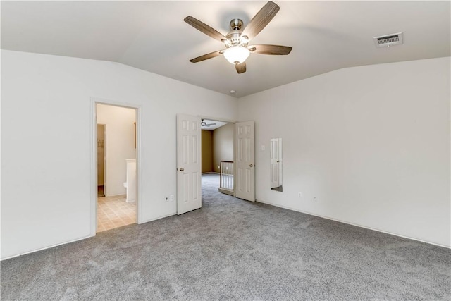 2306 Wilma Rudolph Rd, Austin, TX 78748 - unfurnished room featuring lofted ceiling, carpet flooring, and a ceiling fan
