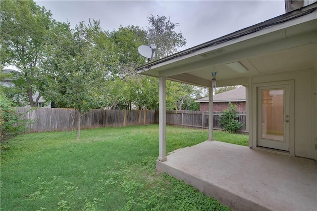 2306 Wilma Rudolph Rd, Austin, TX 78748 - fenced backyard with a patio area
