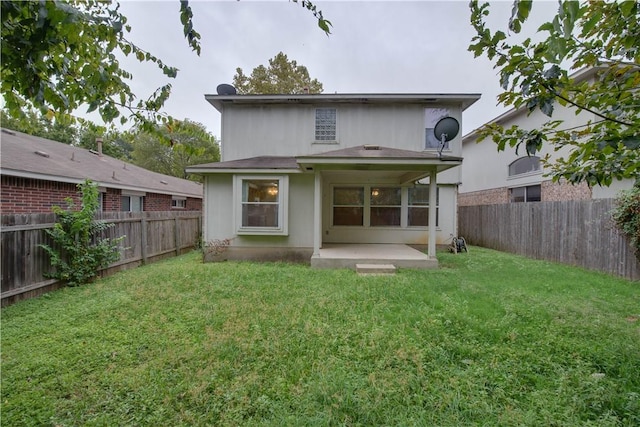 2306 Wilma Rudolph Rd, Austin, TX 78748 - back of property featuring a patio area and a fenced backyard