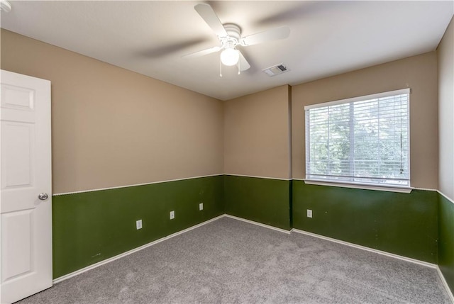 2306 Wilma Rudolph Rd, Austin, TX 78748 - carpeted empty room with a ceiling fan and baseboards