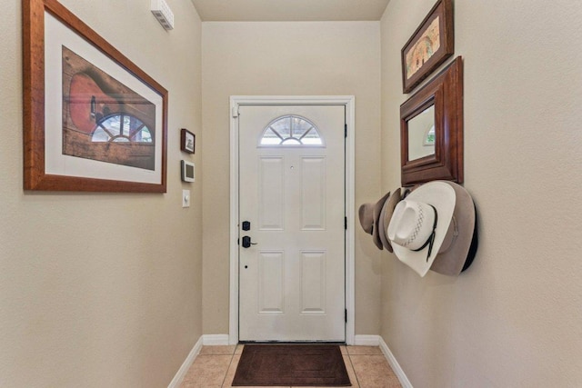 157 Old Firetower Rd, Bastrop, TX 78602 - entryway featuring light tile patterned floors and baseboards