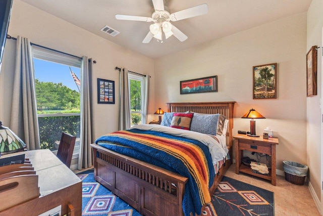 157 Old Firetower Rd, Bastrop, TX 78602 - bedroom featuring ceiling fan and tile patterned flooring