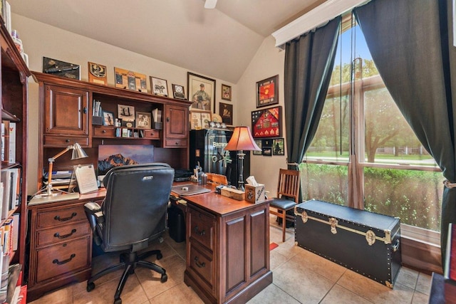 157 Old Firetower Rd, Bastrop, TX 78602 - home office with vaulted ceiling, light tile patterned flooring, and a ceiling fan