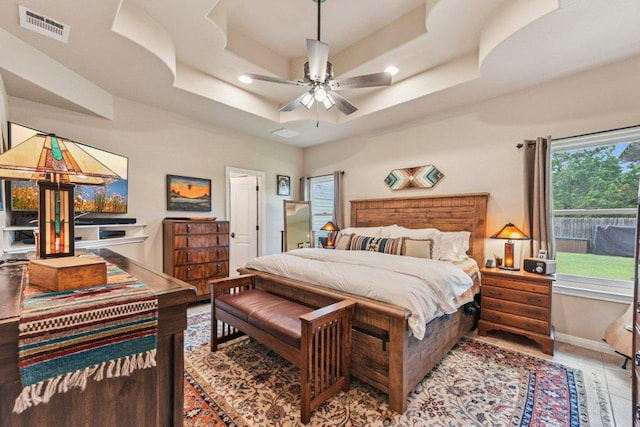157 Old Firetower Rd, Bastrop, TX 78602 - bedroom with a raised ceiling, recessed lighting, and a ceiling fan