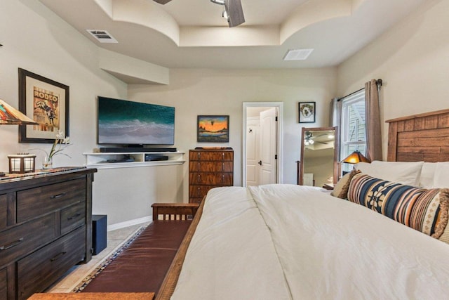 157 Old Firetower Rd, Bastrop, TX 78602 - bedroom with a raised ceiling and baseboards