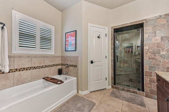 157 Old Firetower Rd, Bastrop, TX 78602 - bathroom with a bath, vanity, a shower stall, and tile patterned flooring